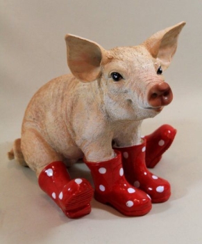 Schwein rot mit Gummistiefel